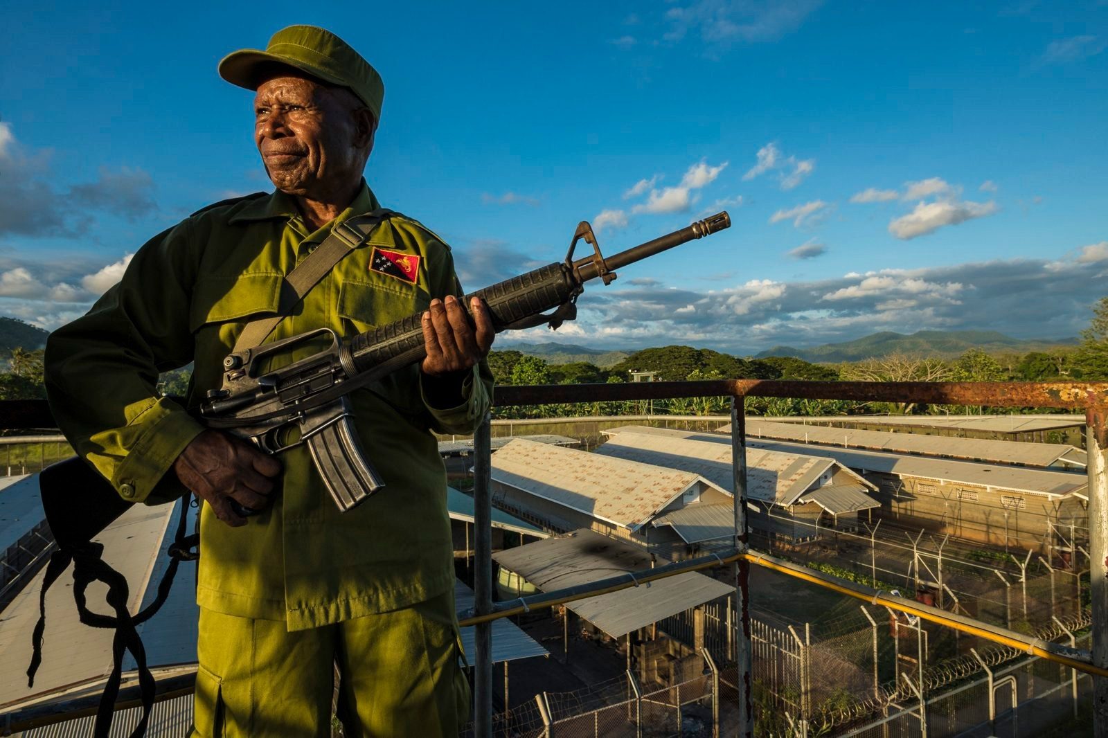 Armed guard on a watchtower above Bomana prison near Port Moresby