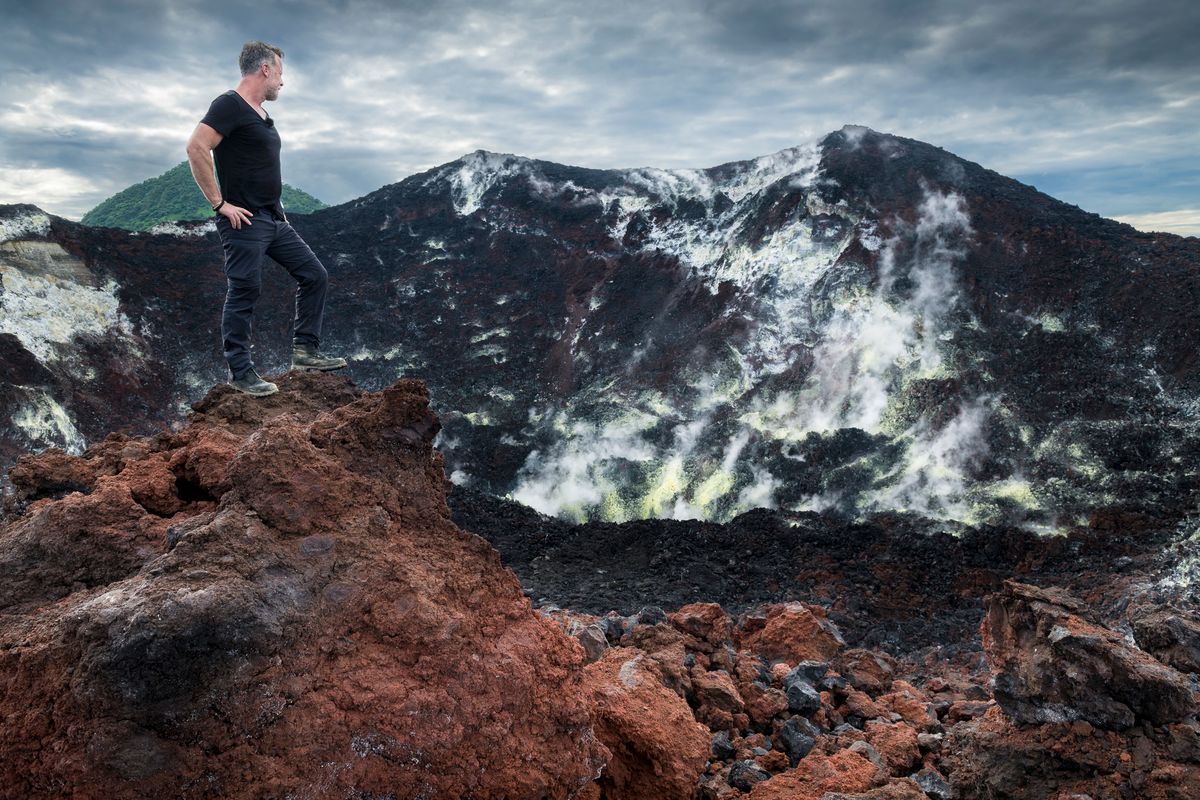 Presenter at the steaming crater of Tavurvur volcano, East New Britain