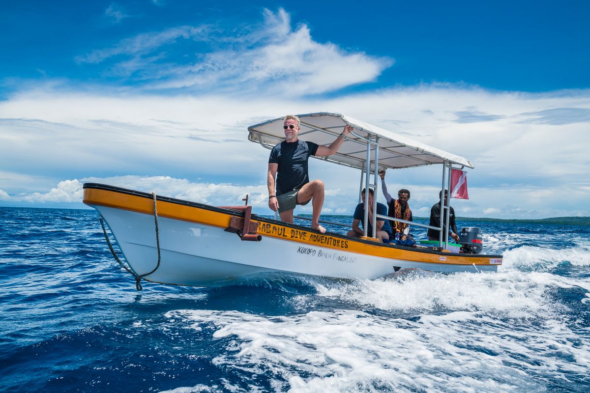 Presenter on a dive boat off Kokopo, East New Britain